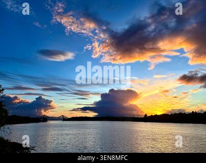 Dramatic clouds over Connel at sunset. Stock Photo