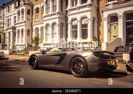 LONDON - APRIL 18, 2026: HAMMERSMITH – McLaren sports car on residential street Stock Photo