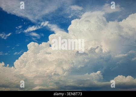 Beautiful dramatic high white clouds in a blue sky Stock Photo
