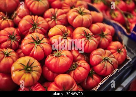 Beefsteak tomatoes for sale at a farmers market Stock Photo