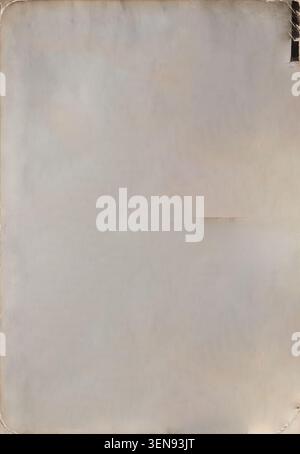 Photography mockup featuring a textured sepia paper frame with distressed vintage edges and a blank central space for design or image insertion. Stock Photo