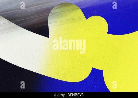Bold yellow organic blob shape with white diagonal stripe on vivid blue background grunge texture Stock Photo
