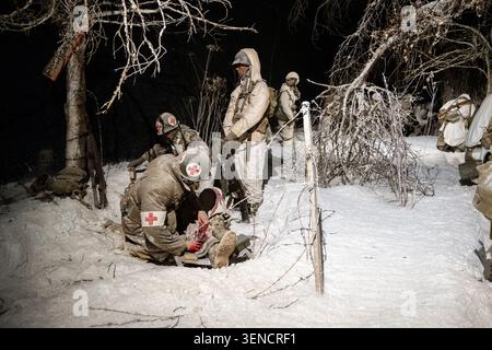 Diekirch, Luxembourg - 23 Feb 25: World War II combat medic diorama showing casualty care in snow at the Musee National d'Histoire Militaire, Diekirch Stock Photo