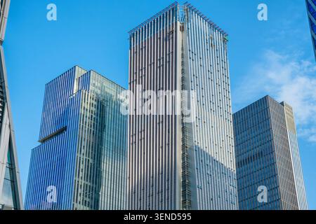 Modern office towers with reflective glass facades in Shenzhen financial and commercial district, Guangdong Province, China. Modern construction and Stock Photo