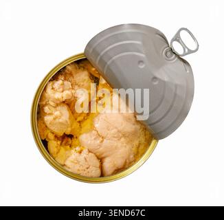 Cod liver canned in oil is presented in an open tin container on a solid white background, showing a close up professional overhead view, not AI gener Stock Photo