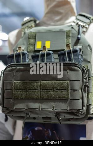 Tactical Plate Carrier Vest With Multiple Loaded Ammunition Magazines. Stock Photo