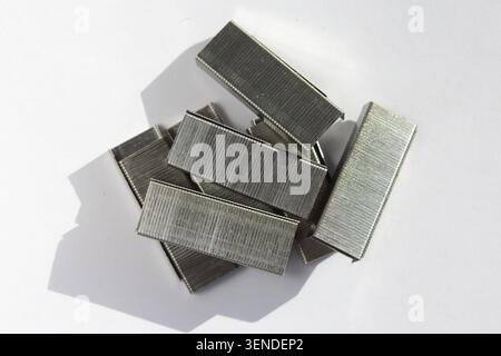 heap of staples isolated on white Stock Photo