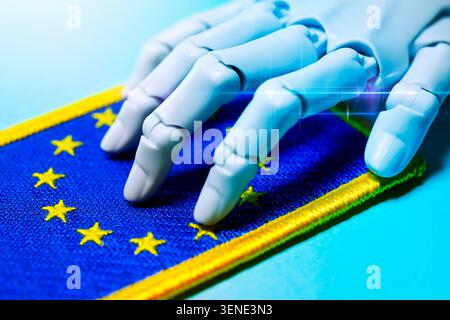 A robot hand on EU flag, photomontage Stock Photo
