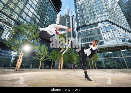 Businessmen fighting concept. Self-defense for women concept. Business fight. Stock Photo