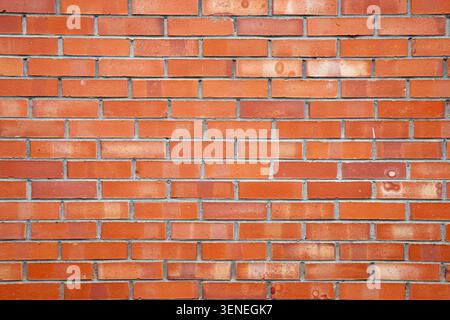 Red brick wall background with plenty of copy space. Stock Photo