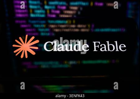 Paris, France - June 11, 2026: The Claude Fable logo displayed on a digital screen with lines of computer code in the background. Stock Photo
