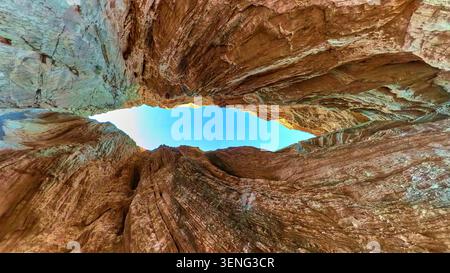 360 Slot Canyon Sky View Rugged Rock Walls and Sunlight in Nevada Stock Photo