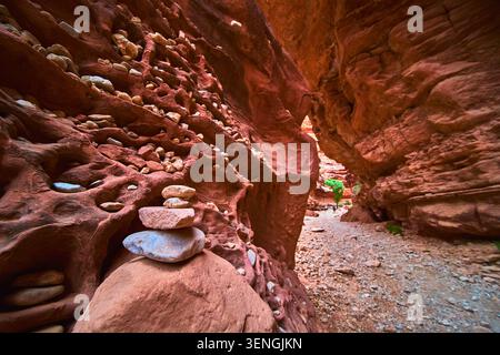 Havasupai Canyon Rock Stack Cairn and Trail with Red Rock Formations Stock Photo