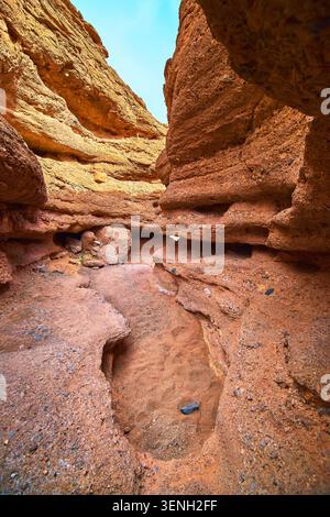 Slot Canyon Curves and Sandstone Texture in Dramatic Desert Light Stock Photo