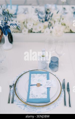 Elegant blue and white wedding dinner table setting Stock Photo