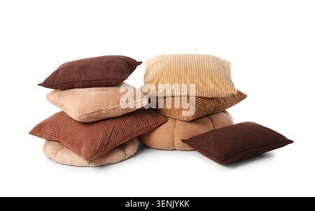 Comfortable stack of assorted brown and beige pillows for home decor and interior design, isolated on white background, the pillows feature various te Stock Photo