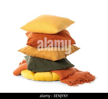 Stack of cozy decorative pillows and soft knitted blanket for home comfort and interior design, the items are isolated on a clean white background, th Stock Photo