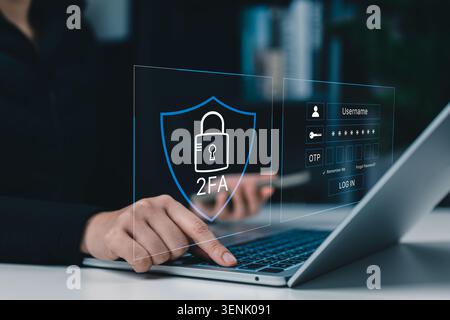Two factor authentication login and cybersecurity protection concept. Person using laptop with 2FA shield, password, OTP code, username fields, Stock Photo