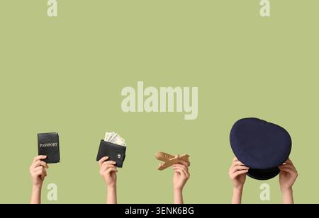 Travel planning essentials: passport, wallet with money, wooden airplane, and pilot hat for global adventures Stock Photo
