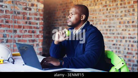 Thinking, black man and architect in office with laptop for project, city plan or building development. Brainstorming, computer and male structural Stock Photo