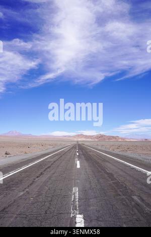 Empty Road Stretching to Horizon Through Atacama Desert, Chile Stock Photo