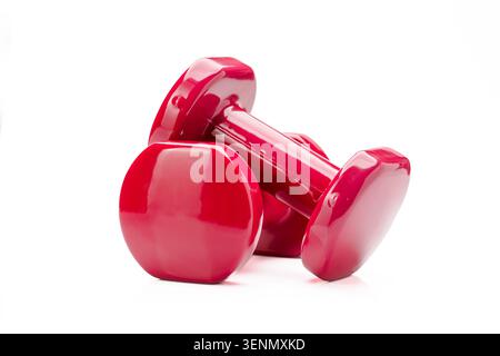 Pair of pink dumbbells isolated on white background representing fitness and healthy lifestyle Stock Photo
