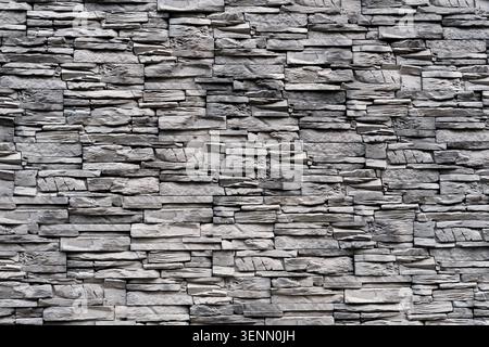 Decorative slate stone cladding surface for interior or exterior design. Stock Photo