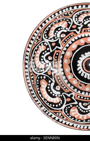 Part of craft brown ceramic painted empty plate isolated on white background closeup Stock Photo