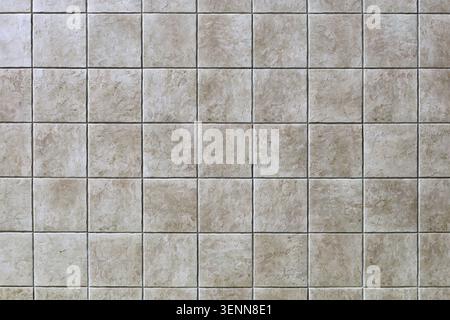 Light brown ceramic tiled floor with stone effect, rustic style. Background and texture. Stock Photo