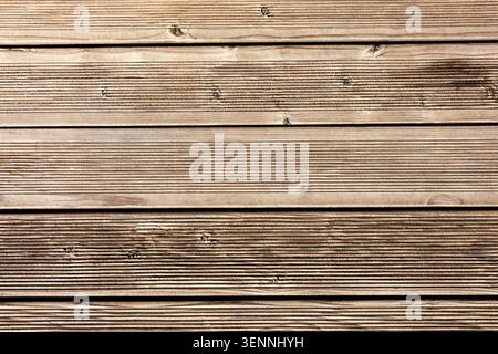 Textured wooden blue background. The background is made of blue boards painted in blue. Stock Photo