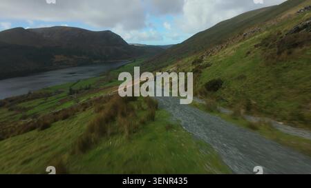 Snowdon Ranger Path FPV Aerial Over Welsh Highlands. Stock Photo