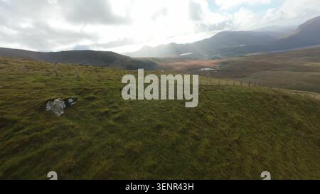 Snowdonia FPV: Dynamic Flight Over Ranger Path Hiking Trail Stock Photo