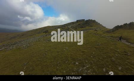 Mount Snowdon FPV Aerial Over Rugged Welsh Highlands Stock Photo