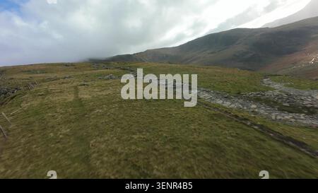 Mount Snowdon FPV Aerial Over Rugged Welsh Highlands Stock Photo