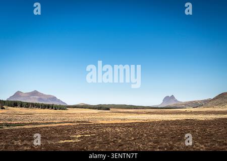 A sunny, summer HDR landscape image of Suilven and Cul Mor from Ledmore Junction in Assynt, Sutherland, Scotland. 28th May 2026 Stock Photo