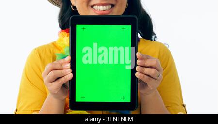 Happy woman, hands and tablet with green screen for advertising or marketing against a white studio background. Closeup of female person smile showing Stock Photo