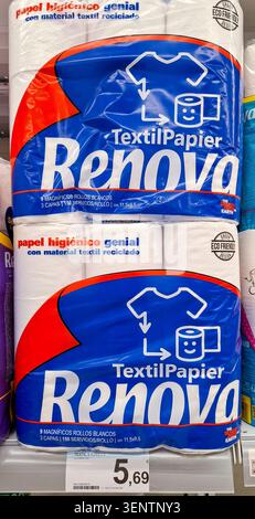 DENIA, SPAIN - January 24, 2026.Renova TextilPapier toilet rolls made from recycled materials are stacked neatly on a shelf in a grocery store in Spai Stock Photo
