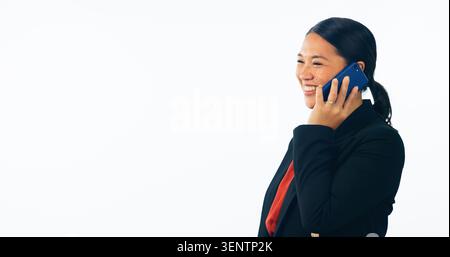 Business woman, phone call and happy communication for networking in human resources on studio banner or mockup. Employee talking on mobile or voip Stock Photo