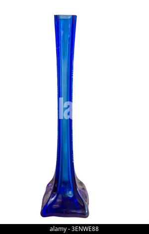 Thin tall blue glass vase for flowers isolated on white background. Stock Photo