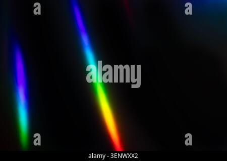 Abstract Vibrant Light Spectrum with Rainbow Colors on Dark Background Stock Photo