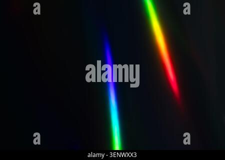 Abstract Rainbow Light Leaks on Dark Background - Vibrant Spectrum in Motion Stock Photo