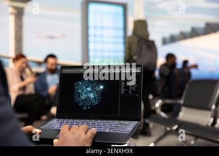 Businessman working with generative AI and large language model on laptop in airport terminal, processing data through cloud computing systems. Casual entrepreneur uses automation. Stock Photo