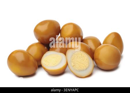 Smoked quail eggs on white background Stock Photo