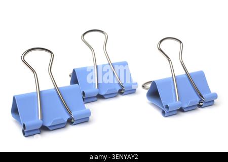 Blue paper clips on white background Stock Photo