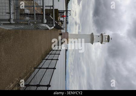 View of a lighthouse on the Edinburgh coast against a cloudy sky in summer 2018 Stock Photo
