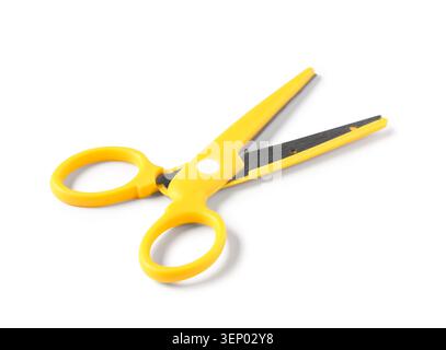 Bright yellow scissors with open blades, crafting and cutting tool for office and school supplies, isolated on white background Stock Photo