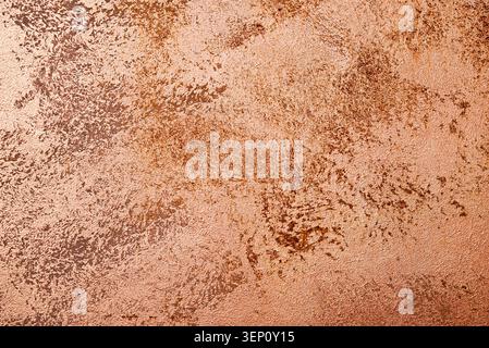 Close-up of distressed plaster surface coated with pearlescent paint. Organic irregular pattern with subtle metallic highlights and textured depth. Stock Photo