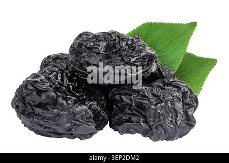 Prunes isolated on white background, heap of dried plums Stock Photo