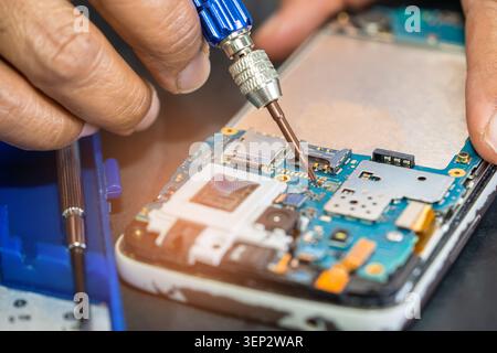 Repairing and upgrade circuit mainboard of notebook, electronic, computer hardware and technology concept. Stock Photo