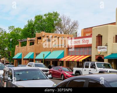 Santa Fe, NM - May 6 , 2026 -Thick adobe walls and log poles provide structural support to adobe buildings - 2 Stock Photo
